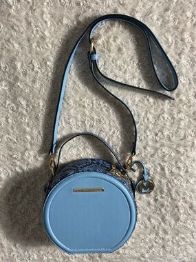 Mia K. Collection Sky Blue Circle Snake-Print Crossbody Bag